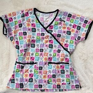 Colorful Snowflake Scrub Top with Black Trim